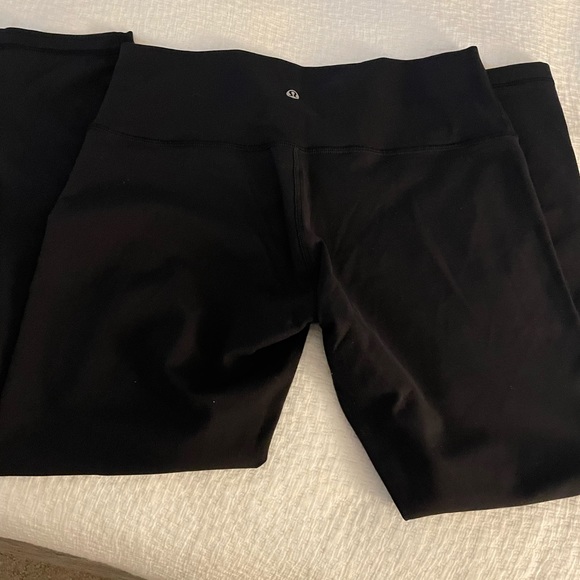 LULULEMON ATHLETICA WUNDER UNDER 25” BLACK LUON PANTS SIZE 12 - Picture 1 of 5